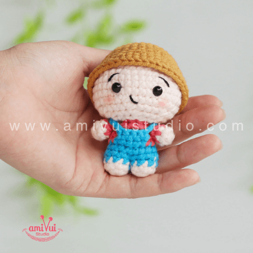 Amigurumi baby boy doll with a hat free crochet pattern